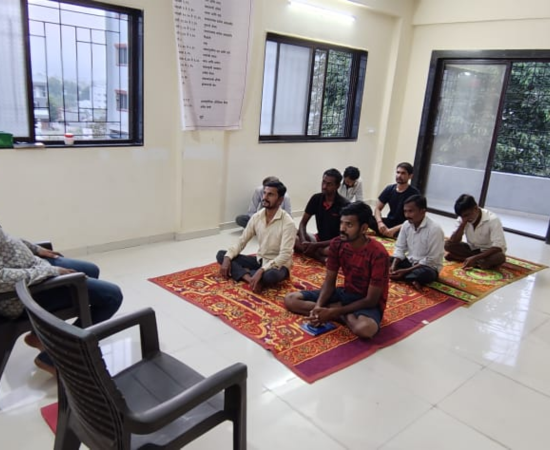 Calm seated wellness posture during sunrise